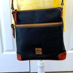 Black Dooney and Bourke pebble leather cross body purse.